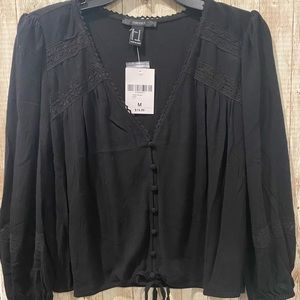 Forever 21 3/4 sleeve blouse. Tie string at bottom. Medium